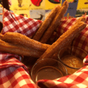 Foto de Churros con salsa de chocolate y arequipe (7 piezas)