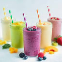 Foto de Smoothies de Frutos del bosque / Frutilla / Mango Maracuya  (con leche)