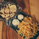 Foto de Tabla de Rabas y Papas fritas