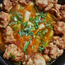 Foto de Tteok Bo Kki Con Pollo Frito