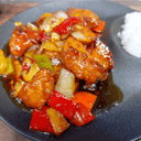 Foto de Solomillo de cerdo agridulce con verduras de temporada y arroz